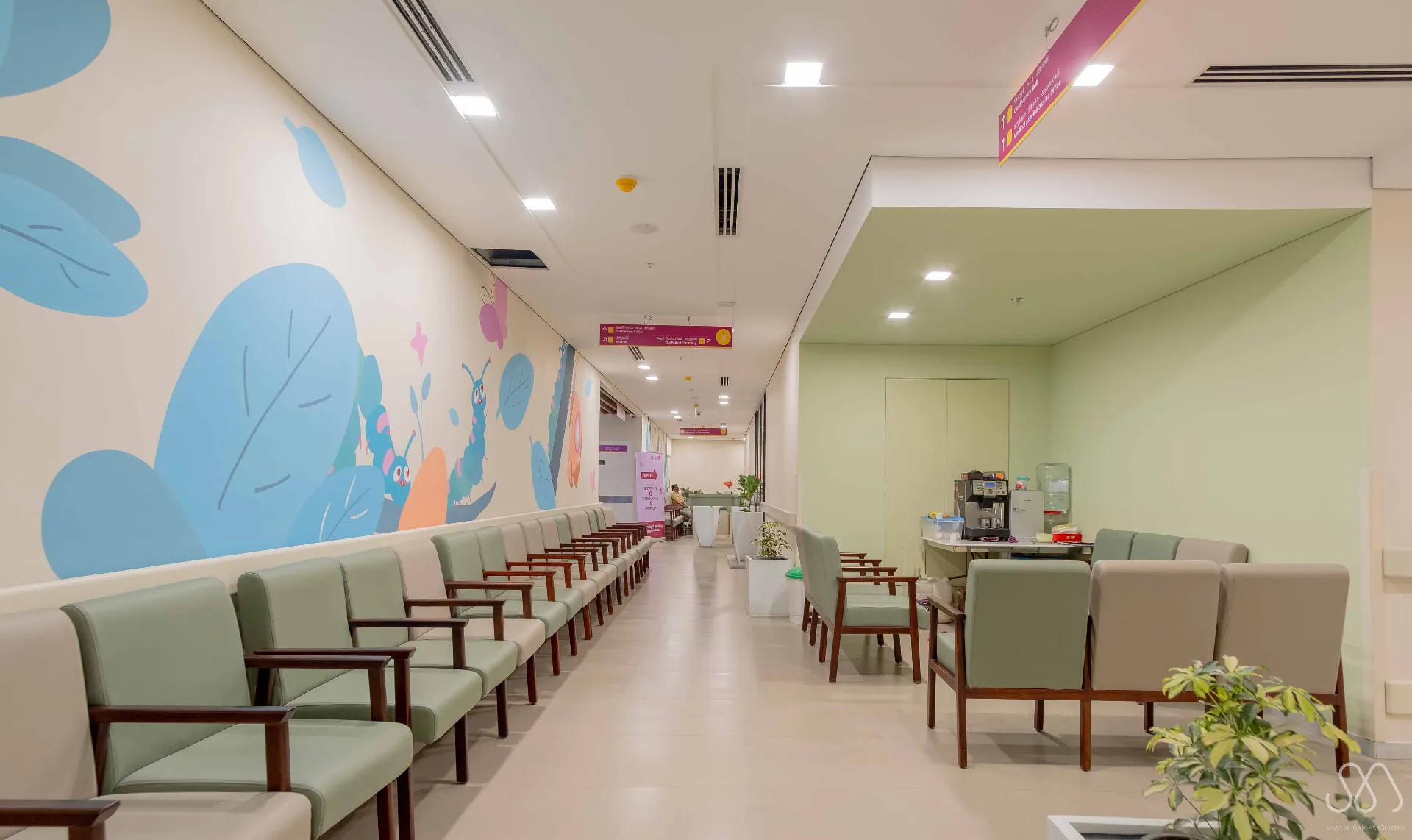 Kauvery Hospital - Waiting lounge lined with caterpillar mural artwork